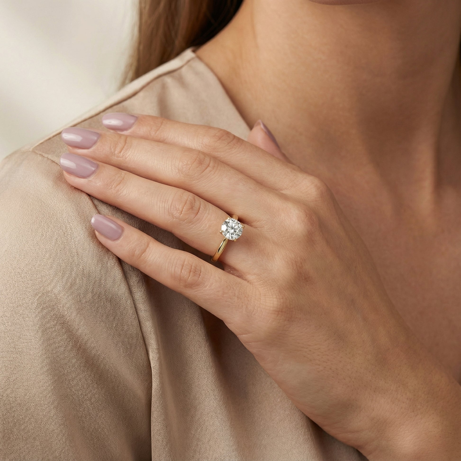 Round cut lab grown diamond solitaire engagement ring in yellow gold with floral basket setting