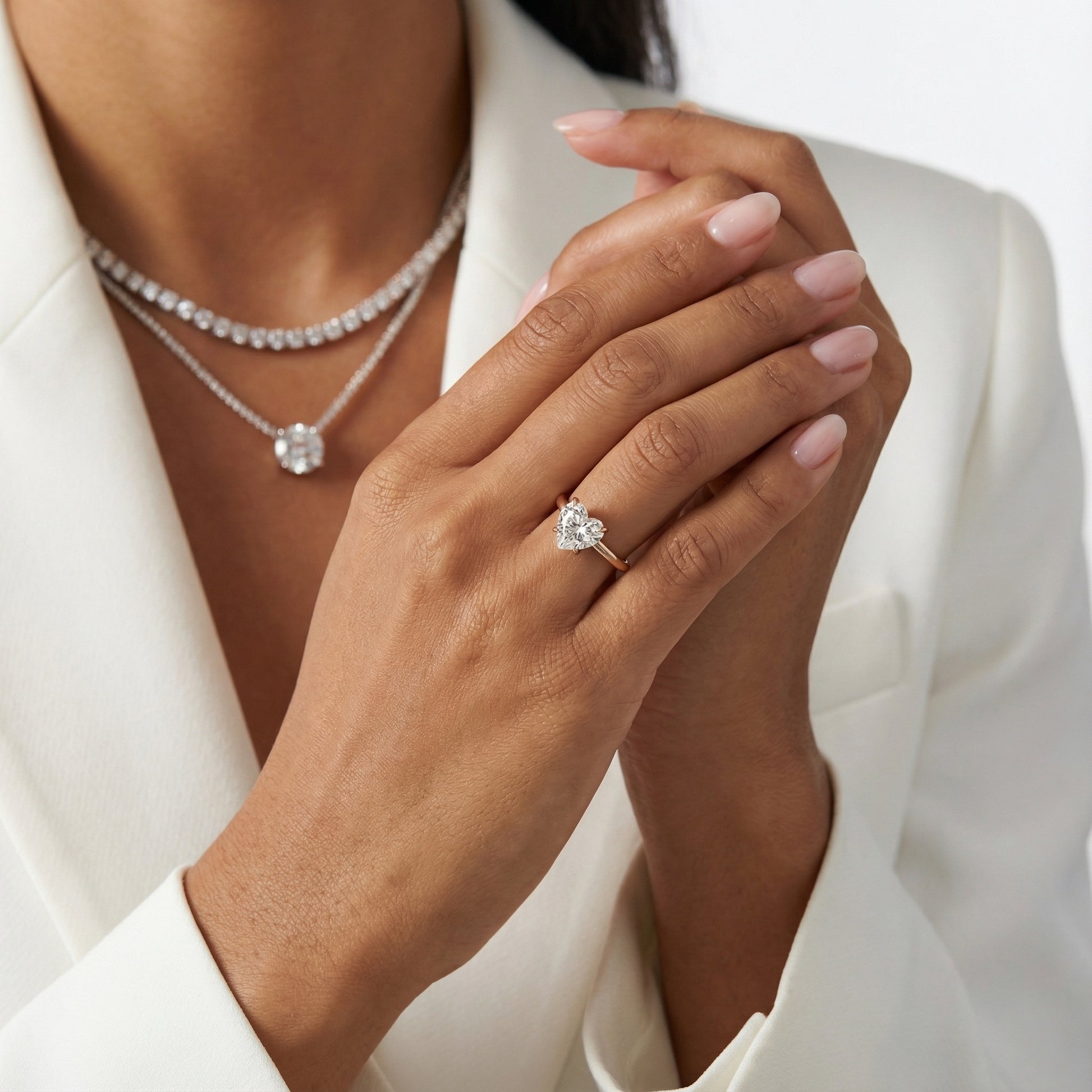Heart Cut Lab Grown Diamond Solitaire Engagement Ring in pink Rose Gold floral setting.