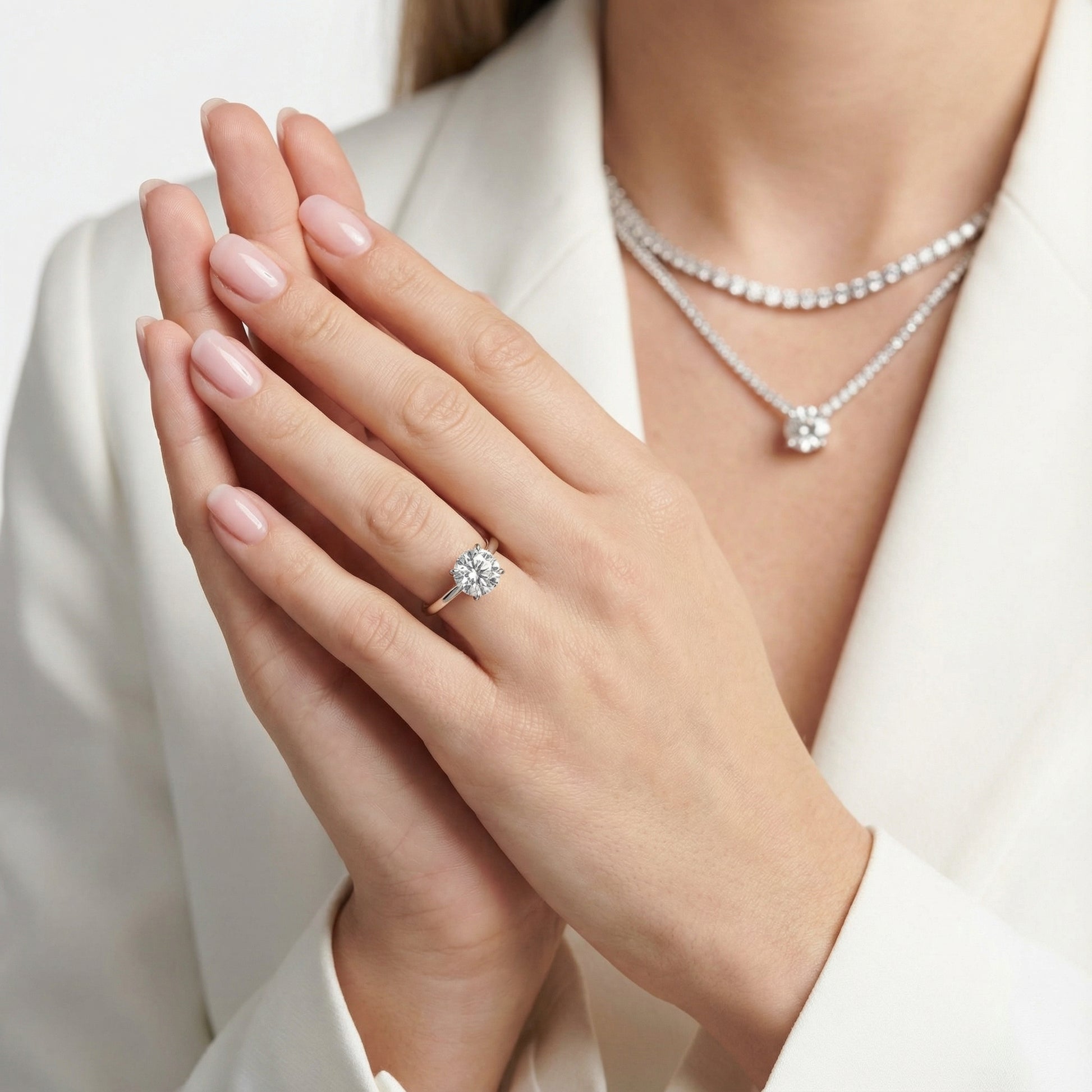 Round cut lab grown diamond solitaire engagement ring in platinum with floral basket setting