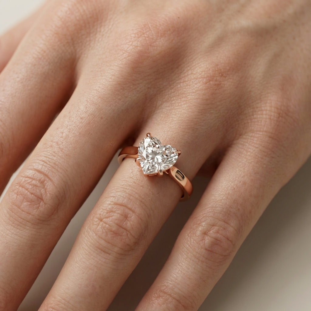 Heart Cut Lab Grown Diamond Solitaire Engagement Ring in pink Rose Gold floral setting.