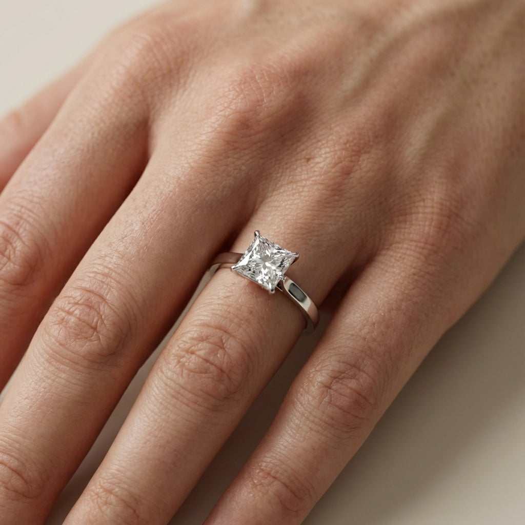 Princess Cut Lab Grown Diamond Solitaire Engagement Ring in White Gold with cathedral setting.