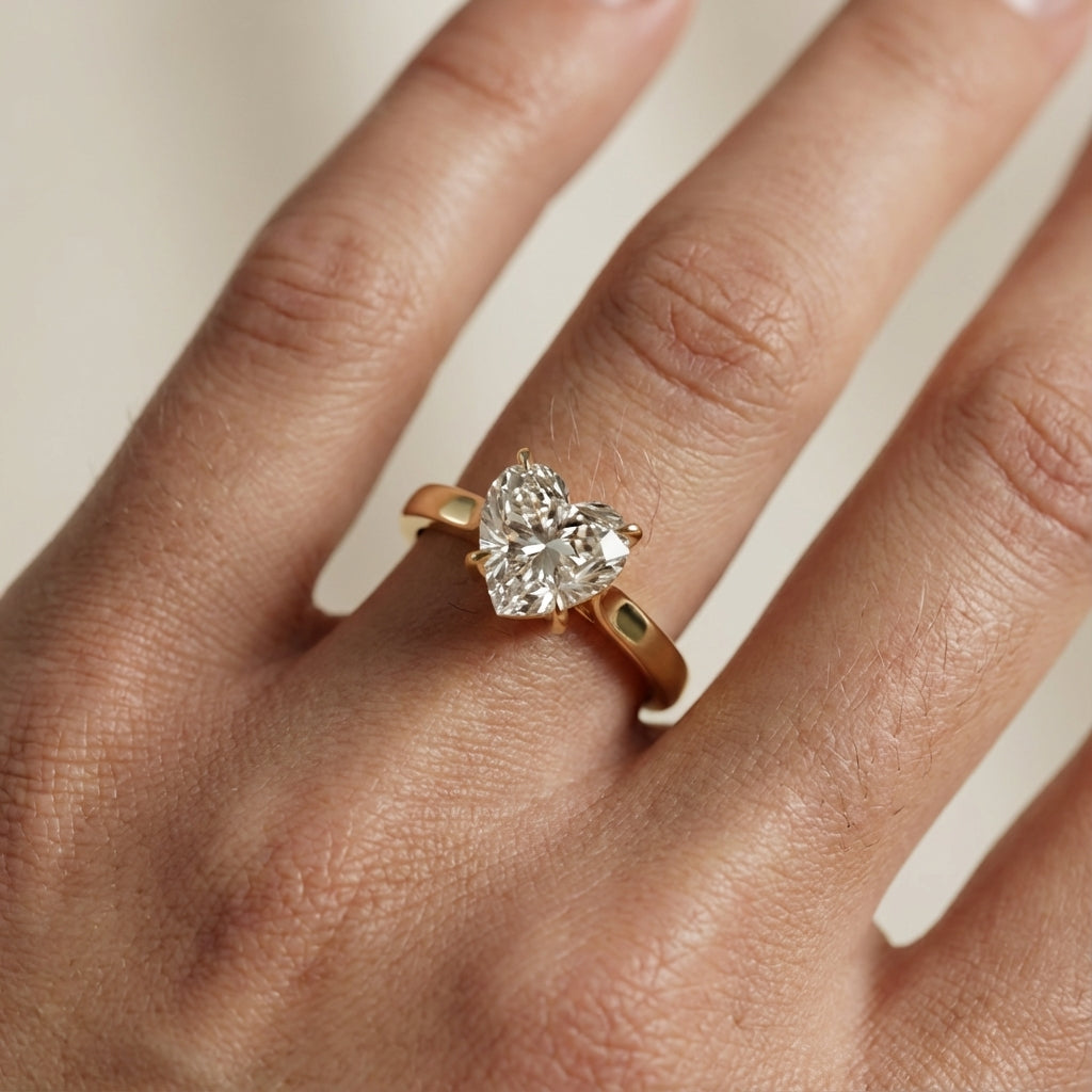 Heart Cut Lab Grown Diamond Solitaire Engagement Ring in traditional Yellow Gold setting.