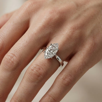 Marquise cut lab grown diamond solitaire engagement ring in durable platinum setting.