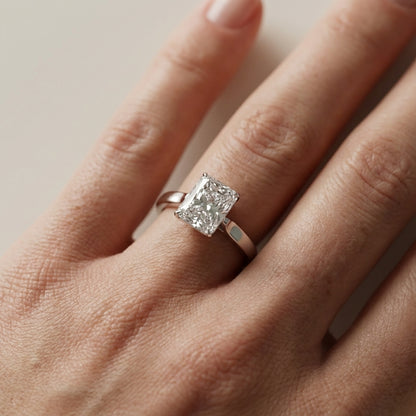Radiant Cut Lab Grown Diamond Solitaire Engagement Ring in Platinum showing floral prongs
