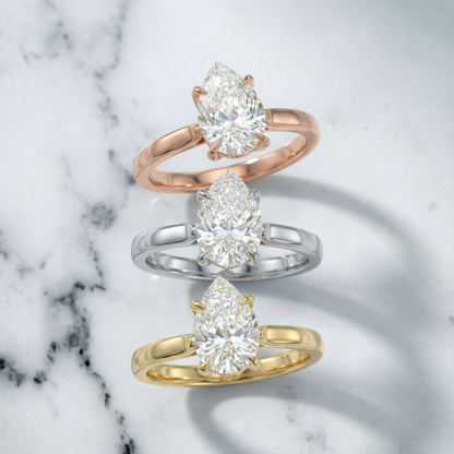 Pear Cut Lab Grown Diamond Solitaire Engagement Ring in Silver with Floral Basket Setting