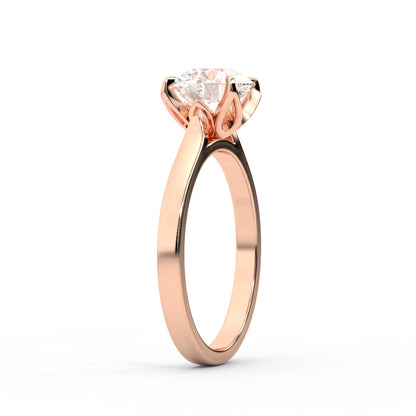 Round cut lab grown diamond solitaire engagement ring in rose gold with floral basket setting