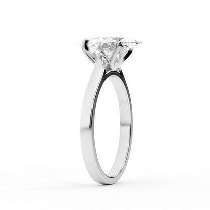 Marquise cut lab grown diamond solitaire engagement ring in polished silver setting.