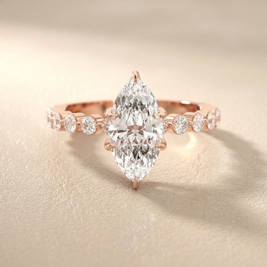 Marquise Cut Lab Grown Diamond Engagement Ring with floating side stones set in Rose Gold