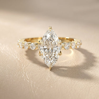 Marquise Cut Lab Grown Diamond Engagement Ring with floating side stones set in Yellow Gold