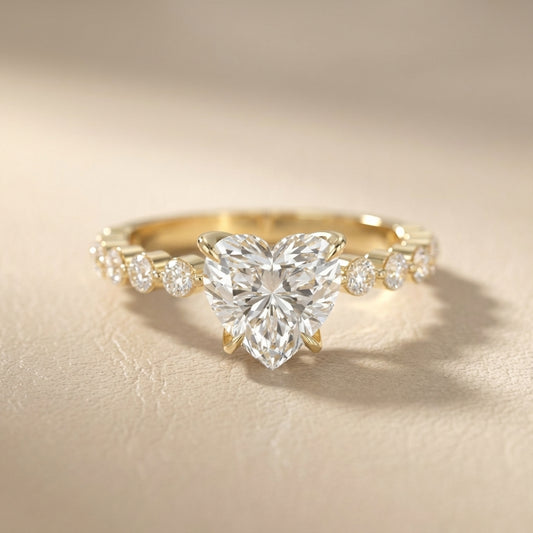 Heart Cut Lab Grown Diamond Side Stone Engagement Ring in Yellow Gold setting
