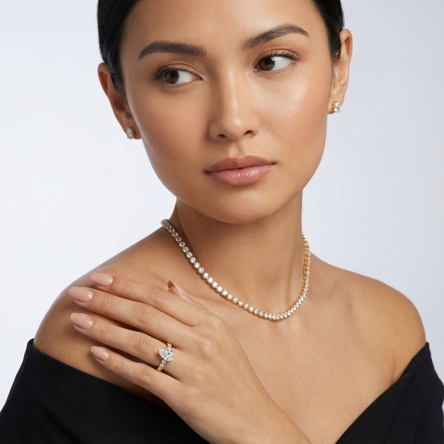 Pear Cut Lab Grown Diamond Engagement Ring with floating side stones in Yellow Gold