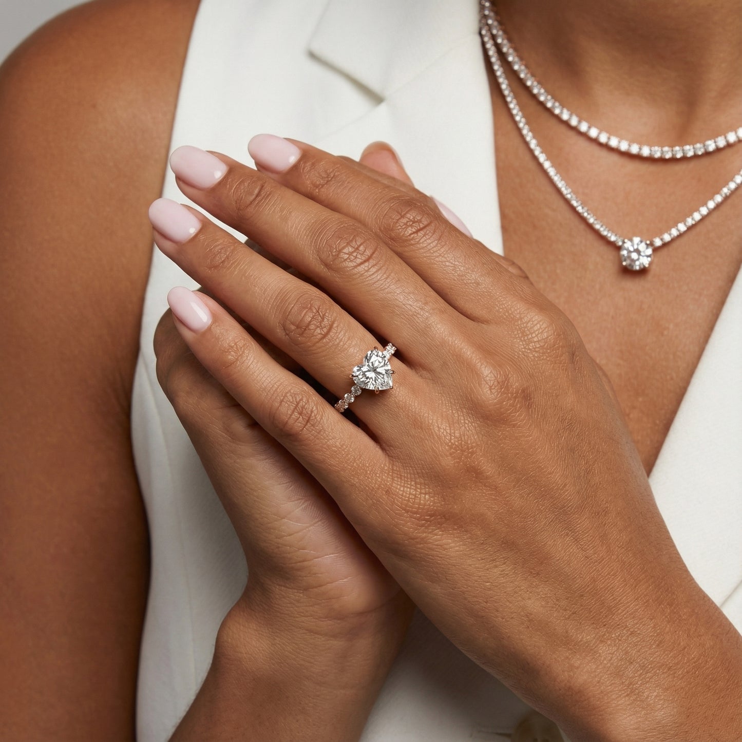 Heart Cut Lab Grown Diamond Side Stone Engagement Ring in Rose Gold setting