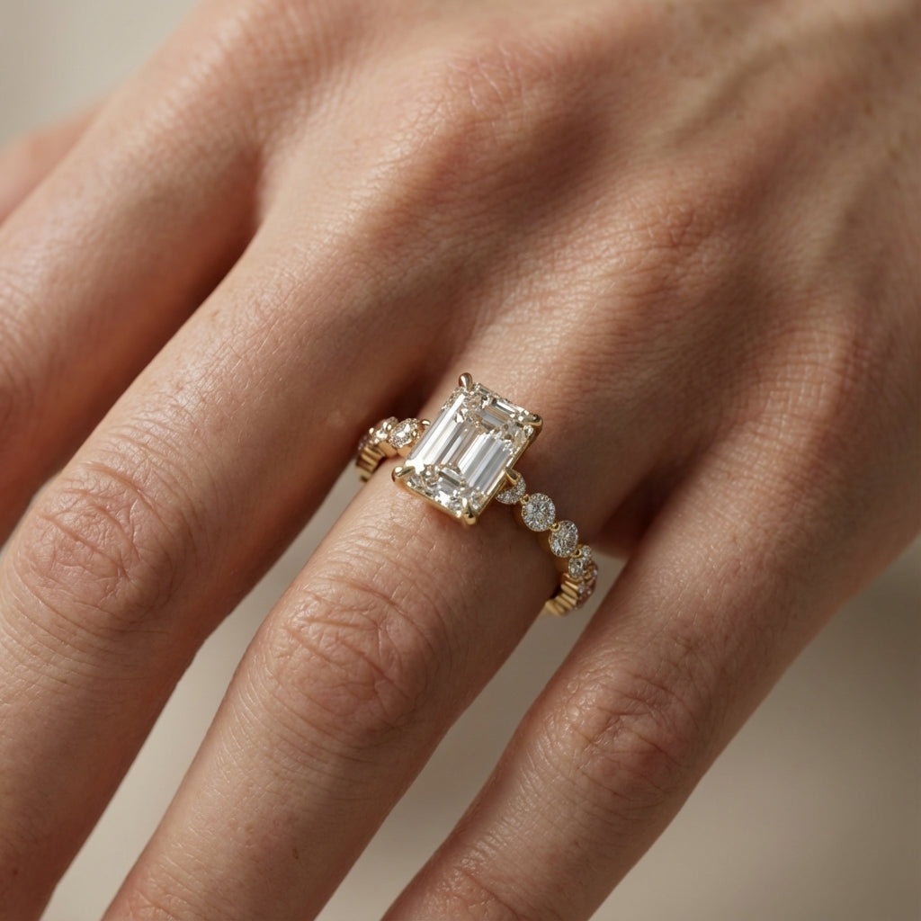 Emerald Cut Lab Grown Diamond Engagement Ring with Side Stones in Yellow Gold