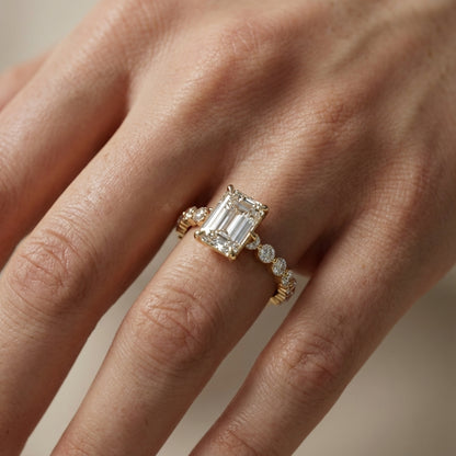 Emerald Cut Lab Grown Diamond Engagement Ring with Side Stones in Yellow Gold