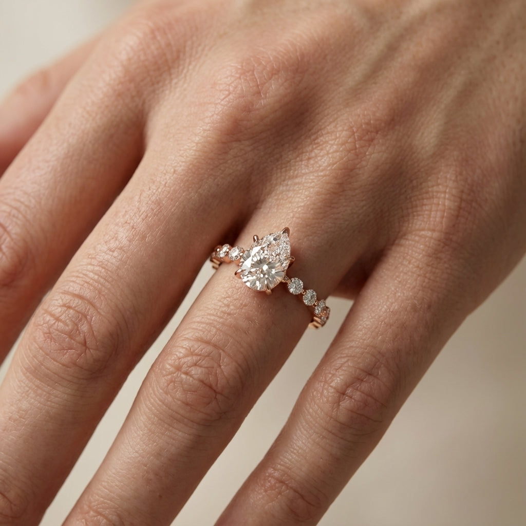 Pear Cut Lab Grown Diamond Engagement Ring with floating side stones in Rose Gold