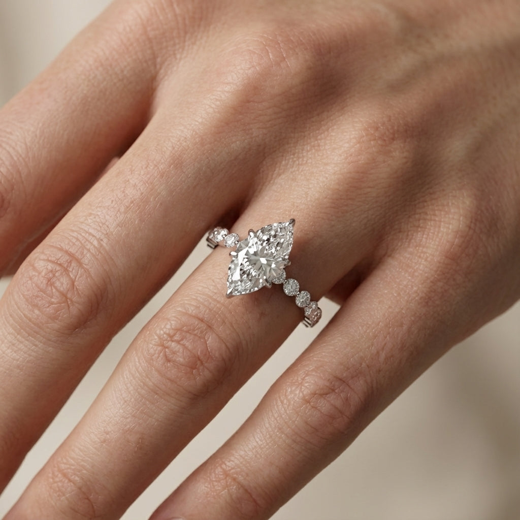 Marquise Cut Lab Grown Diamond Engagement Ring with floating side stones set in Platinum