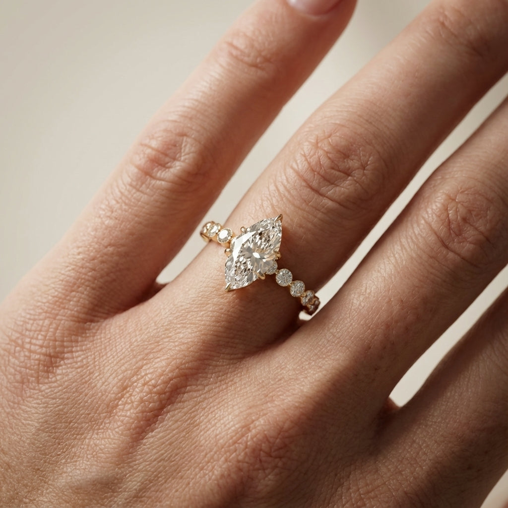 Marquise Cut Lab Grown Diamond Engagement Ring with floating side stones set in Yellow Gold