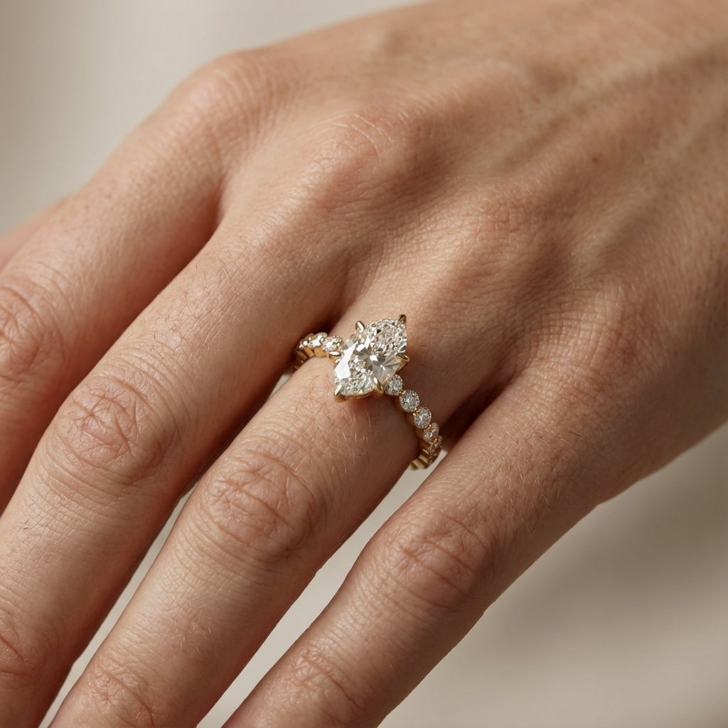 Oval Cut Lab Grown Diamond Eleanor Majesty Engagement Ring with Side Stones in Yellow Gold