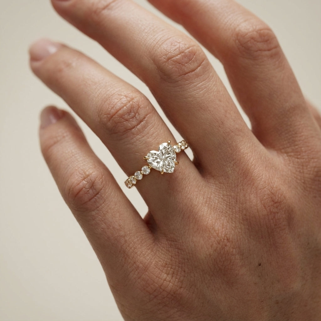 Heart Cut Lab Grown Diamond Side Stone Engagement Ring in Yellow Gold setting