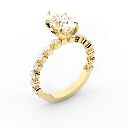 Pear Cut Lab Grown Diamond Engagement Ring with floating side stones in Yellow Gold