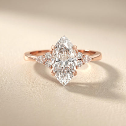 Marquise Cut Lab Grown Diamond Engagement Ring with side stone clusters set in Rose Gold