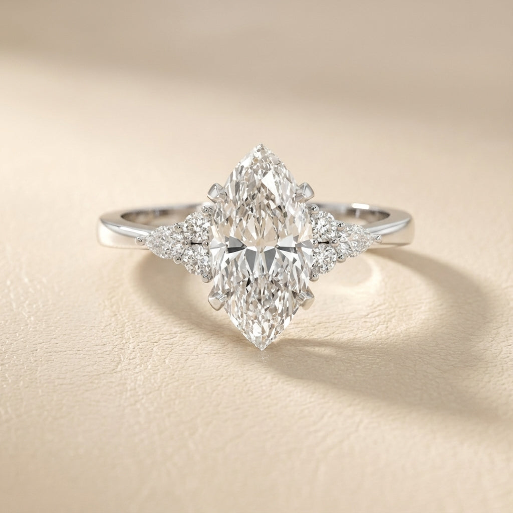Marquise Cut Lab Grown Diamond Engagement Ring with side stone clusters set in Platinum