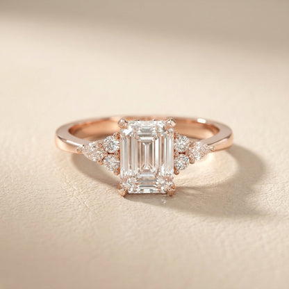 Emerald Cut Lab Grown Diamond Engagement Ring with side stone clusters set in Rose Gold