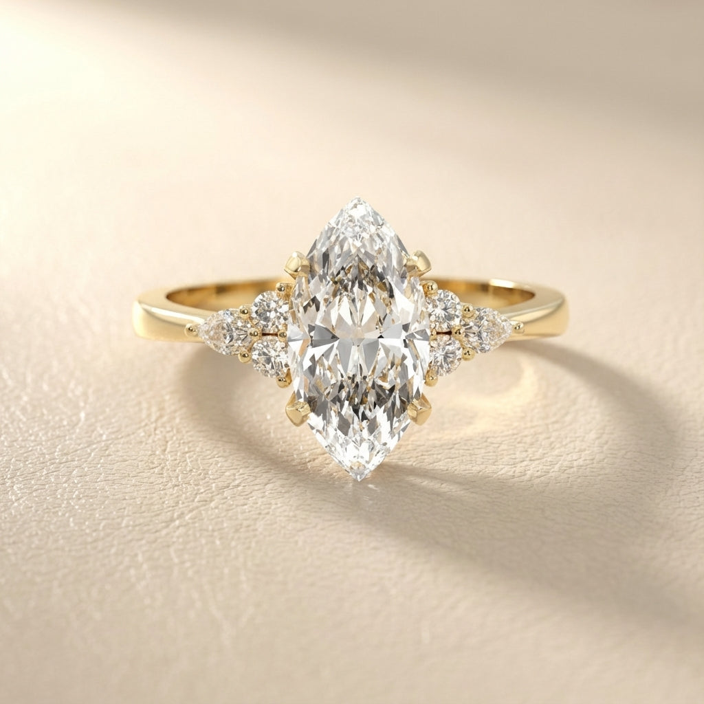 Marquise Cut Lab Grown Diamond Engagement Ring with side stone clusters set in Yellow Gold