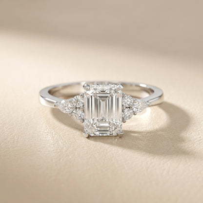 Emerald Cut Lab Grown Diamond Engagement Ring with side stone clusters set in Silver