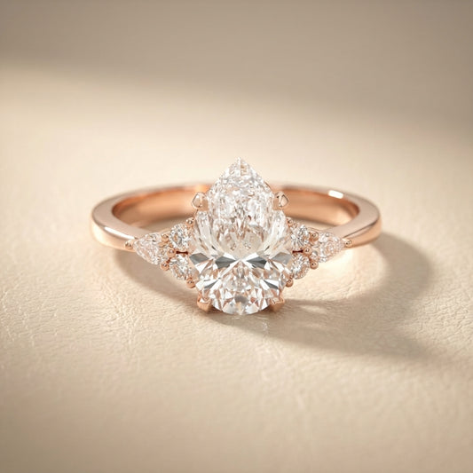 Pear Cut Lab Grown Diamond Three Stone Engagement Ring in Rose Gold