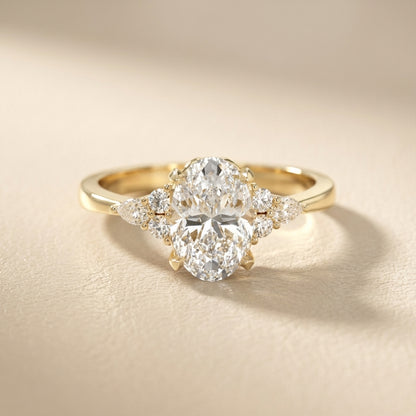 Oval Cut Lab Grown Diamond Three Stone Engagement Ring in Yellow Gold