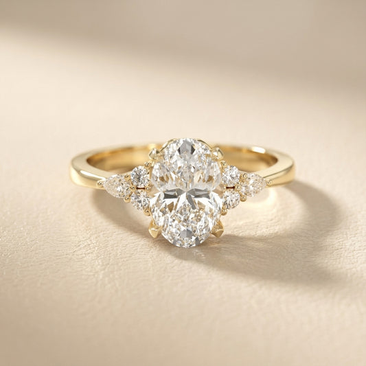 Oval Cut Lab Grown Diamond Three Stone Engagement Ring in Yellow Gold