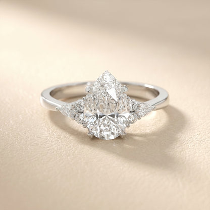 Pear Cut Lab Grown Diamond Three Stone Engagement Ring in Platinum