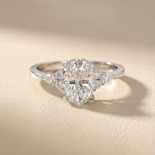 Oval Cut Lab Grown Diamond Three Stone Engagement Ring in Platinum