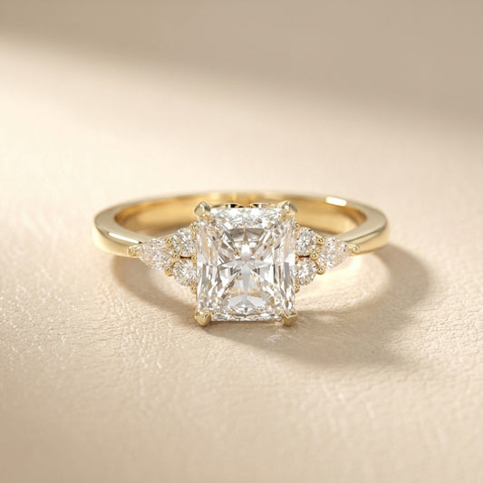 Radiant Cut Lab Grown Diamond Three Stone Engagement Ring in Yellow Gold