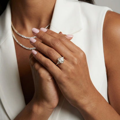 Emerald Cut Lab Grown Diamond Engagement Ring with side stone clusters set in Yellow Gold