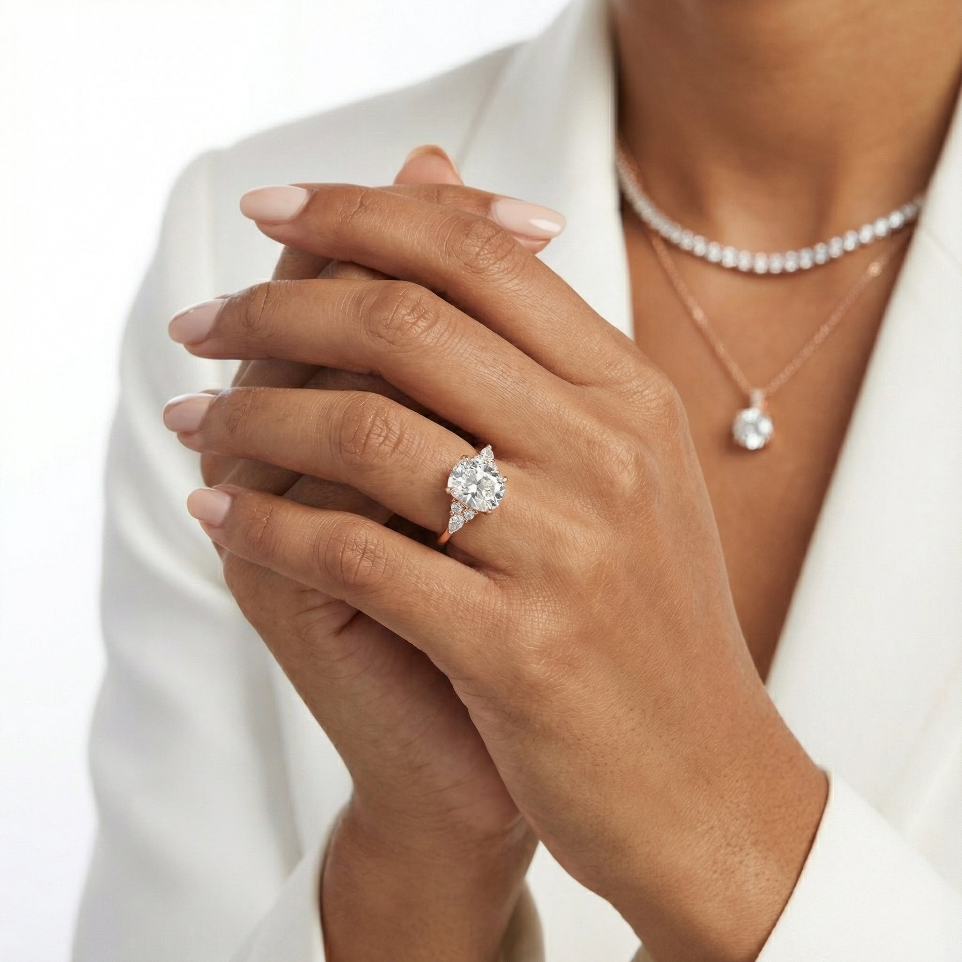 Cushion Cut Lab Grown Diamond Three Stone Engagement Ring in Rose Gold