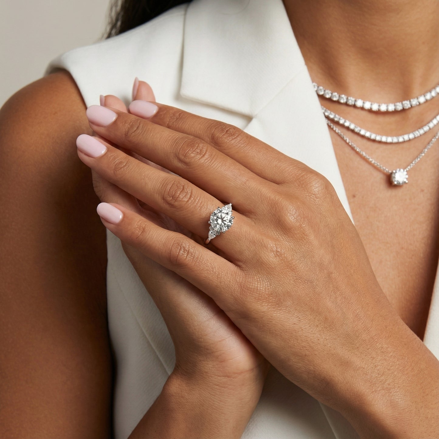 Cushion Cut Lab Grown Diamond Three Stone Engagement Ring in White Gold