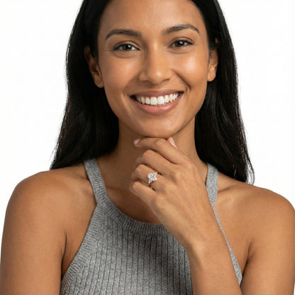 Oval Cut Lab Grown Diamond Three Stone Engagement Ring in Rose Gold