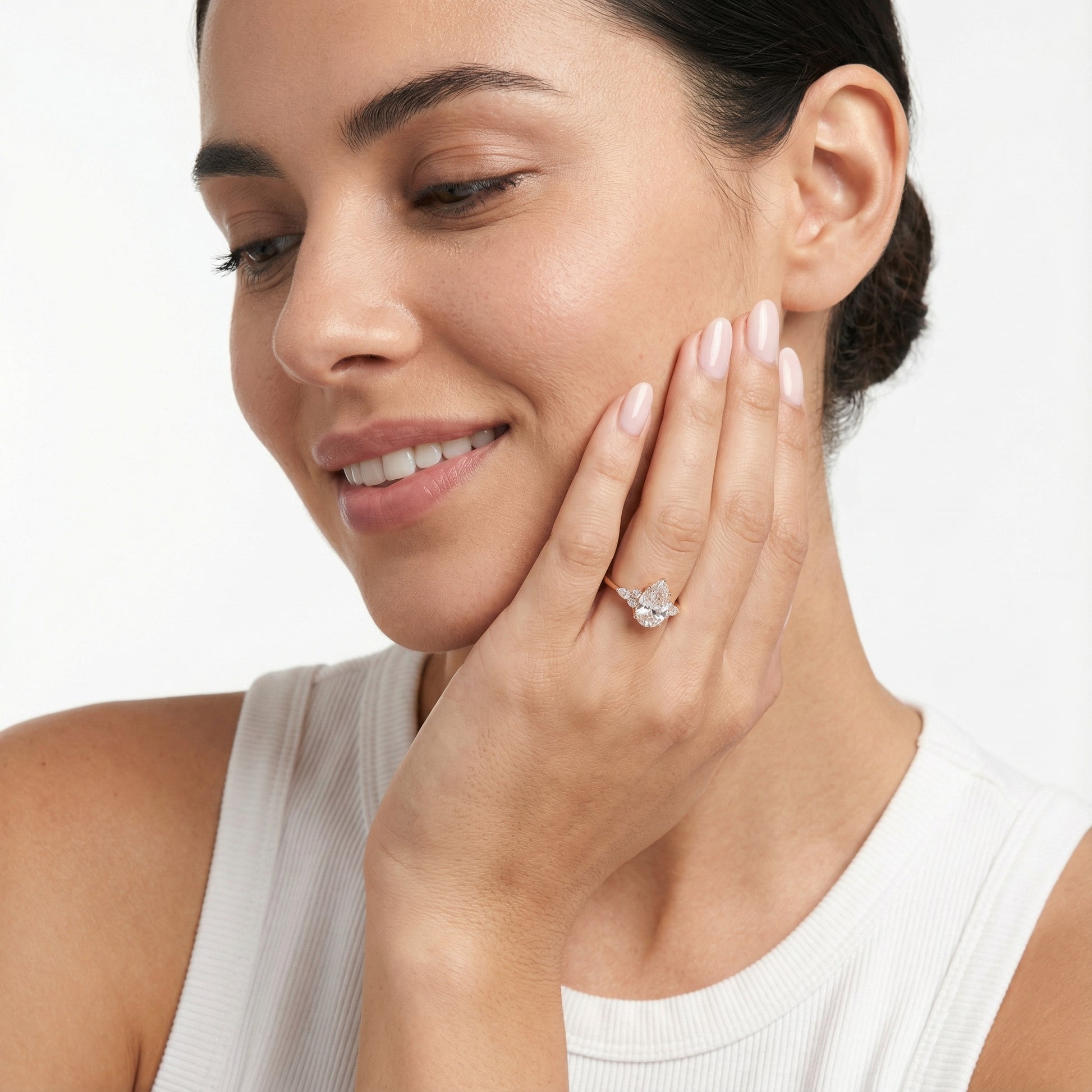 Pear Cut Lab Grown Diamond Three Stone Engagement Ring in Rose Gold