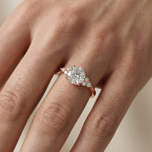 Round Cut Lab Grown Diamond Three Stone Engagement Ring in Rose Gold