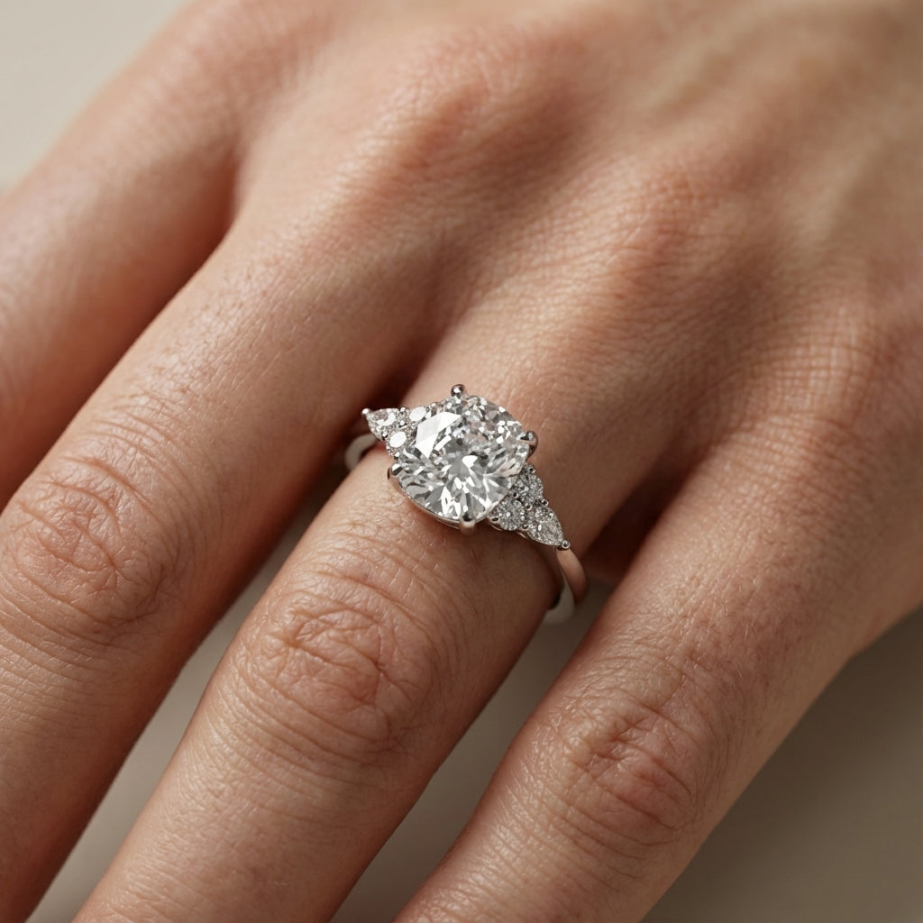 Cushion Cut Lab Grown Diamond Three Stone Engagement Ring in Platinum