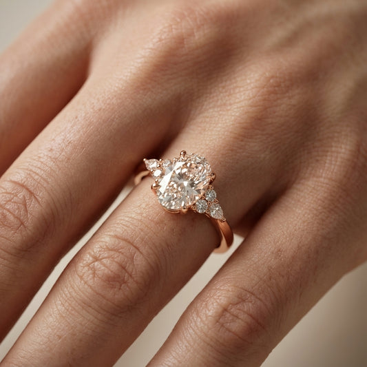 Oval Cut Lab Grown Diamond Three Stone Engagement Ring in Rose Gold