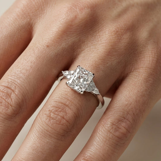 Radiant Cut Lab Grown Diamond Three Stone Engagement Ring in Platinum