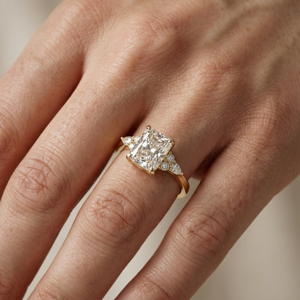 Radiant Cut Lab Grown Diamond Three Stone Engagement Ring in Yellow Gold