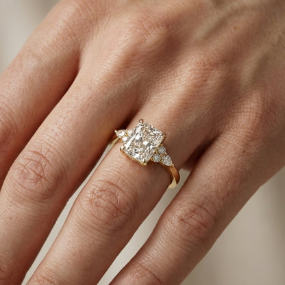 Radiant Cut Lab Grown Diamond Three Stone Engagement Ring in Yellow Gold