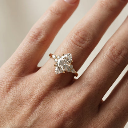 Marquise Cut Lab Grown Diamond Engagement Ring with side stone clusters set in Yellow Gold
