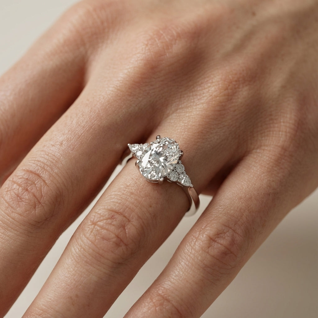 Oval Cut Lab Grown Diamond Three Stone Engagement Ring in White Gold