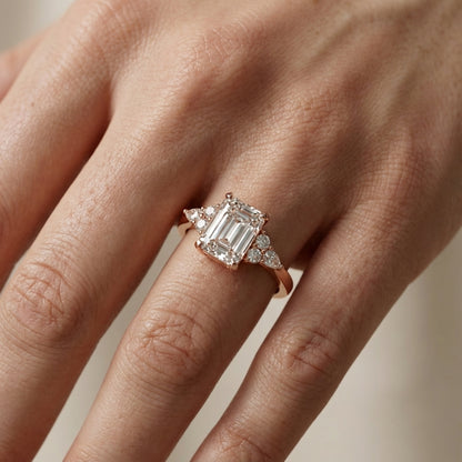 Emerald Cut Lab Grown Diamond Engagement Ring with side stone clusters set in Rose Gold