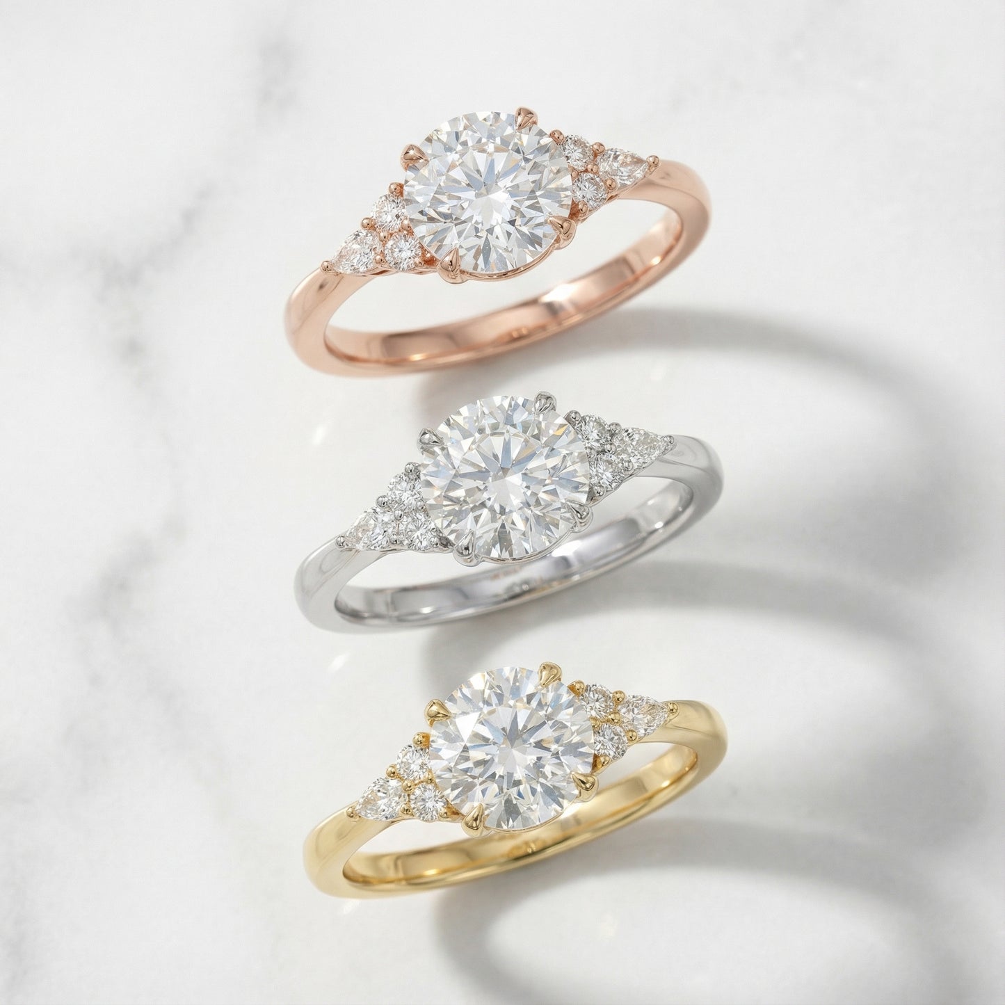 Round Cut Lab Grown Diamond Three Stone Engagement Ring in Rose Gold